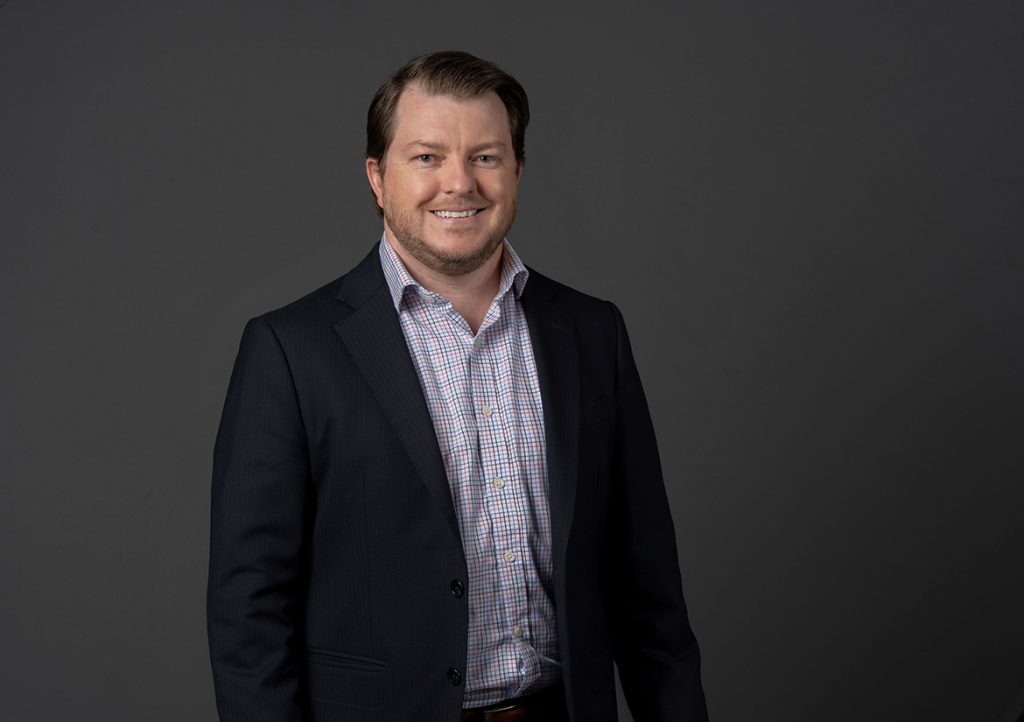 Jarrod Burton wearing a blue blazer